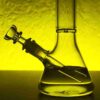 glass bubbler pipe in yellow background